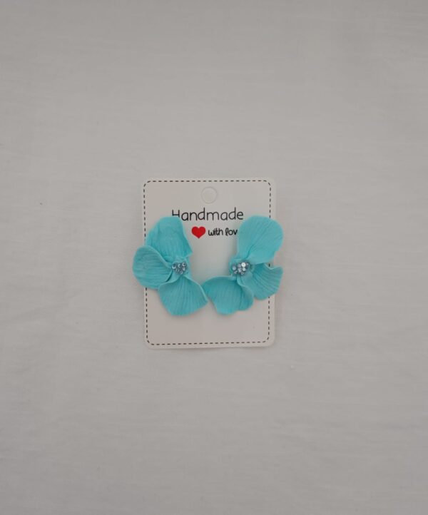 PENDIENTES TRES PETALOS Azul Pastel